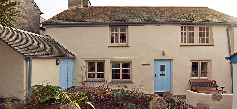 Completed front facing elevation of award-winning restoration project, The Cottage